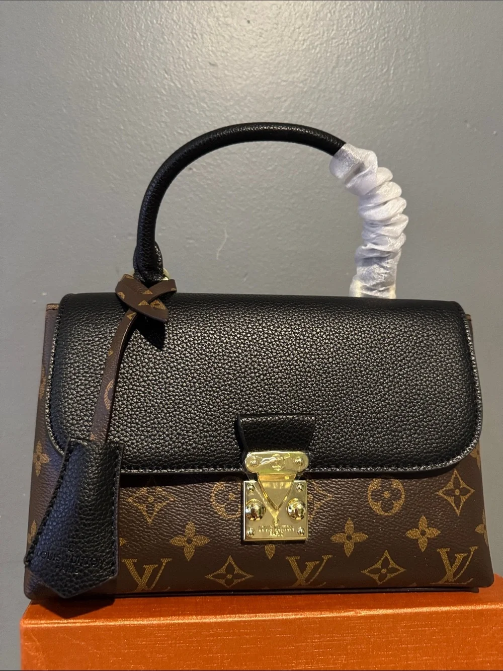 Louis Vuitton satchel signature